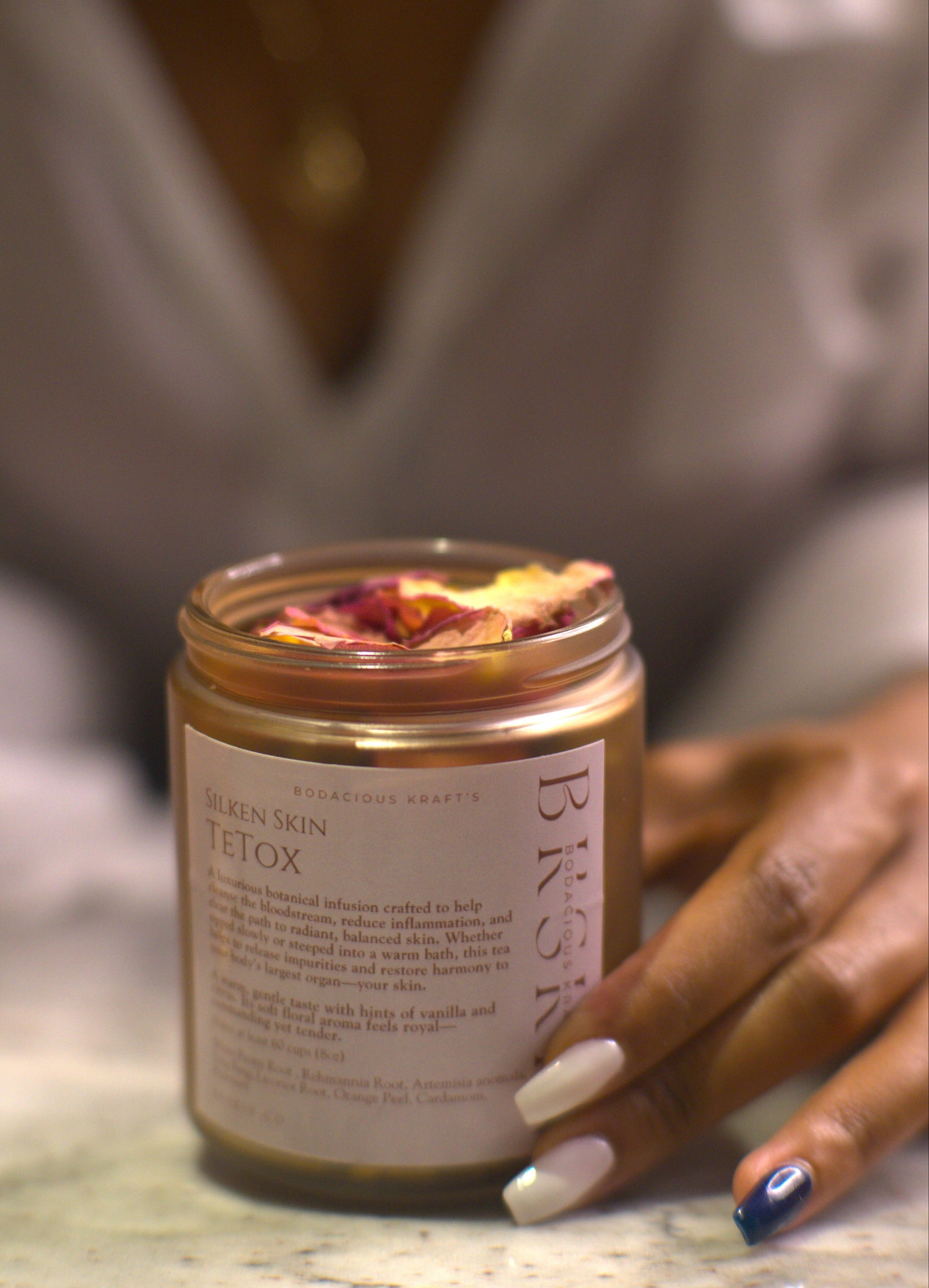 Jar of skincare product with a blurred background