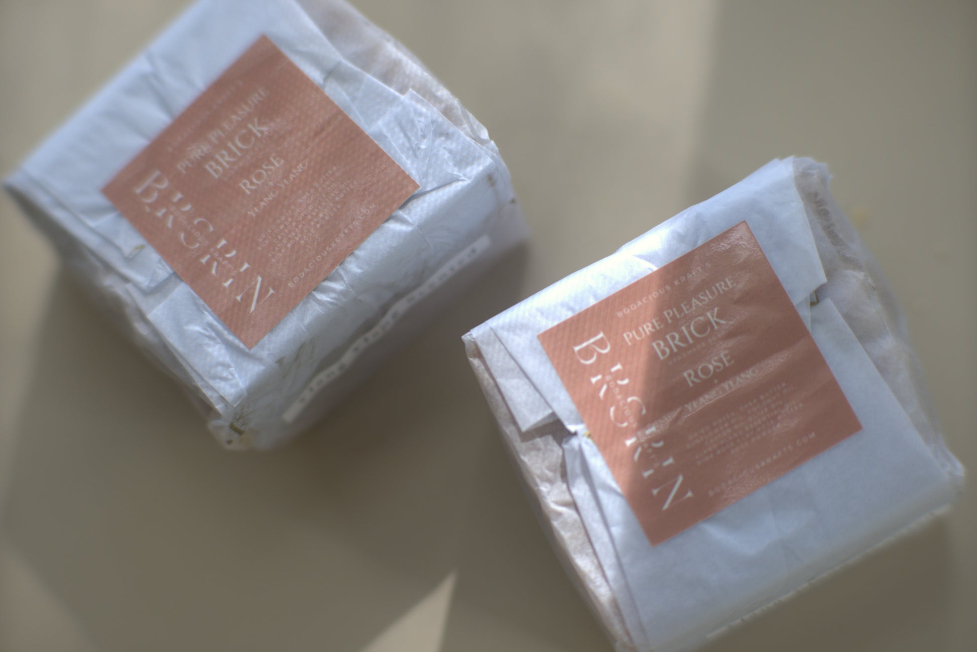 Two soap bars with 'Brick & Rose